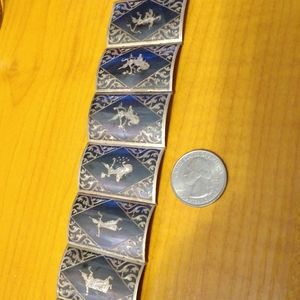 Sterling silver Siam bracelet 7 inches by 1.5 inch